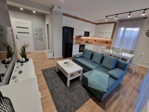 Гостиная зона в Apartament na Letniej