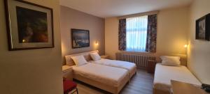 Zona de estar de Alliance Hotel Ieper Centrum