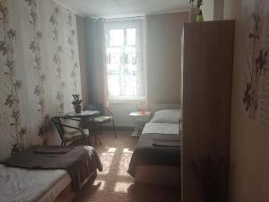 Posteľ alebo postele v izbe v ubytovaní Penzion U Soudu