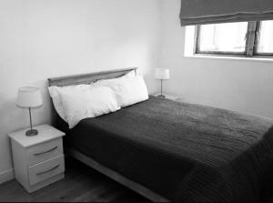 En eller flere senge i et værelse på Shared Flat