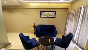 Posezení v ubytování Hotel Merakee - Near Dahisar Mira Road Mumbai