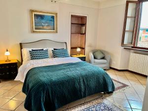 Кровать или кровати в номере Terrazza Giuliana