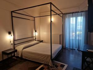 Voodi või voodid majutusasutuse B&B L'Orto Sul Tetto toas