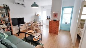 Et tv og/eller underholdning på EMILY BEACH-CITY Apartment