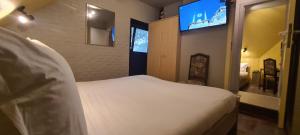 Voodi või voodid majutusasutuse Hotel Landhuis 't Wilgenerf toas