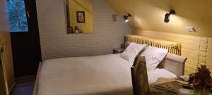 Voodi või voodid majutusasutuse Hotel Landhuis 't Wilgenerf toas