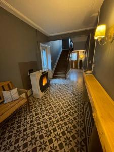 TV a/nebo společenská místnost v ubytování La maison des douceurs