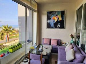 Setusvæði á Melrose Beach - Apartment with a beach view