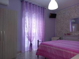 A bed or beds in a room at nAnA'