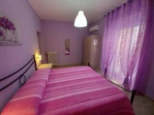 A bed or beds in a room at nAnA'
