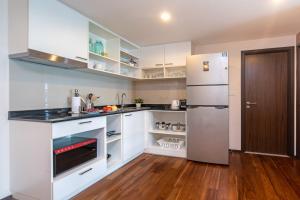 Cucina o angolo cottura di The Title Rawai West Wing Pool View Suite