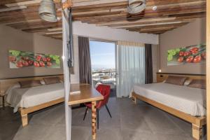 Postel nebo postele na pokoji v ubytování Hotel Da Romano