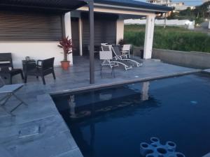 The swimming pool at or close to KAY SE MI