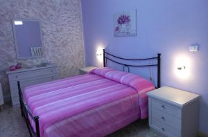 A bed or beds in a room at nAnA'