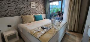 Кровать или кровати в номере The D Hotel Çeşme Resort