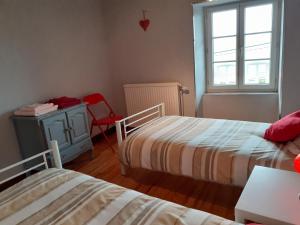 Posteľ alebo postele v izbe v ubytovaní Maison du Soleil chez Isa