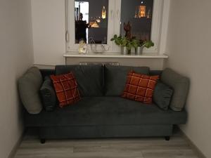 Posedenie v ubytovaní Apartament Długie Ogrody 2 pokojowy