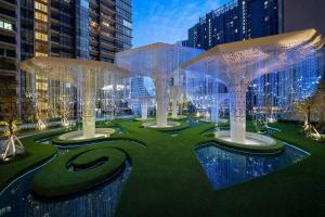 uma representação de um parque com árvores e luzes em Arte Plus KLCC 3BR w/Private Lift by StayBNB em Kuala Lumpur