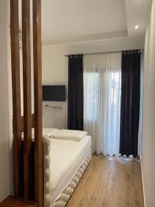 En eller flere senger på et rom på Villa i SPA Stević