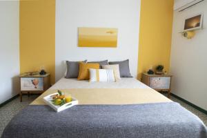 A bed or beds in a room at Casa Derosa in Sorrento Centro