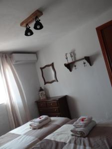 Posteľ alebo postele v izbe v ubytovaní B&B Casa Sarandy