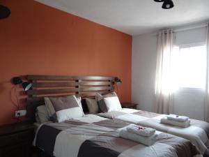 Posteľ alebo postele v izbe v ubytovaní B&B Casa Sarandy