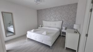 A bed or beds in a room at Casilla de Costa Luxury home