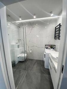 Et badeværelse på Apartament Manhattan City Center