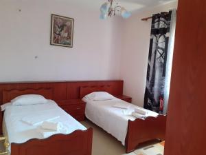 Кровать или кровати в номере Kanushi house