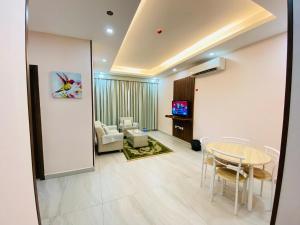 Χώρος καθιστικού στο Summit Hotel Suites - القمة للأجنحة الفندقيه