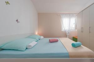 Postel nebo postele na pokoji v ubytování Apartment Kiara with Pool