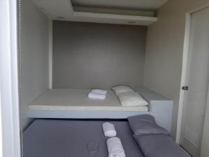 Un pat sau paturi într-o cameră la Mamima Bnb