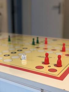 a close up of a board with chess pieces on it at Schöne Auszeit RE14 in Sögel