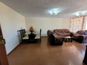 Ein Sitzbereich in der Unterkunft Hermoso apartamento en Miraflores Arequipa