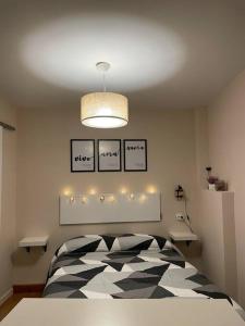 A bed or beds in a room at Habitación con encanto