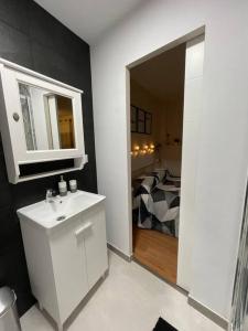A bathroom at Habitación con encanto