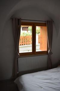 Katil atau katil-katil dalam bilik di Charmant logement de 25m2 dans maison de Pays