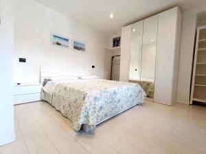 Ένα ή περισσότερα κρεβάτια σε δωμάτιο στο La casetta sul lago