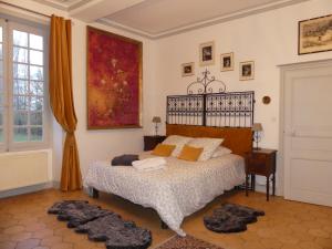 Postel nebo postele na pokoji v ubytování Demeure de Maugé