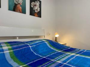 Giường trong phòng chung tại Casa Vacanze da Nonna Beatrice - Camino