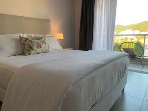 En eller flere senge i et værelse på Soar Luxury Studio en el centro de Salta