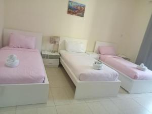 Postel nebo postele na pokoji v ubytování Amazing apartment 2 bed rooms in Tecom 6 pax