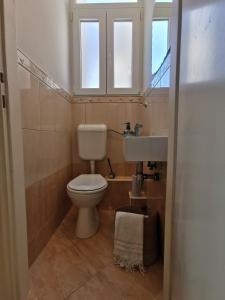 Koupelna v ubytování Apartmani Meri