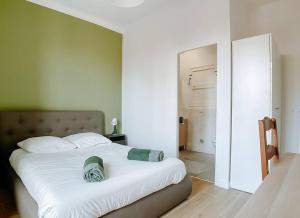 Postel nebo postele na pokoji v ubytování Grand appartement T4 proche centre-ville et mer