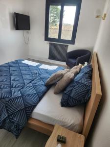 Postel nebo postele na pokoji v ubytování LOCATION T2