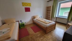 Postel nebo postele na pokoji v ubytování Gasthof Moser