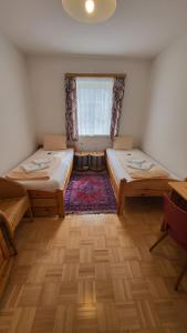 Postel nebo postele na pokoji v ubytování Gasthof Moser