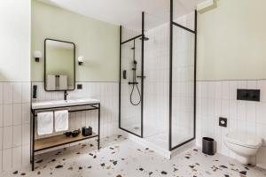Bagno di Hotel Valaisia Crans Montana, a Faern Collection Resort