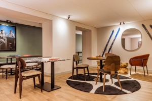 Area soggiorno di Hotel Valaisia Crans Montana, a Faern Collection Resort