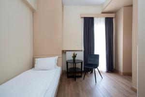 Cama ou camas em um quarto em Abc Hotel